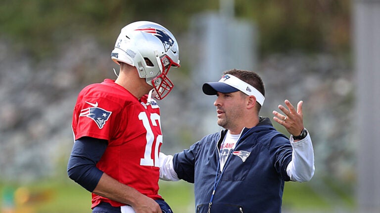 The Patriots practiced on their practice field at Gillette Stadium. Tom Brady and Josh McDaniels chat during warmups.