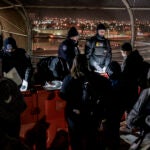 CBP agents check the documents of migrants who have arrived for their appointments at the Paso Del Norte International Bridge in El Paso, Texas, as seen from Ciudad Juárez, Mexico, on Monday, Jan 20, 2025.