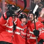MONTREAL, QUEBEC - FEBRUARY 12: (l-r) Colton Parayko #55, Seth Jarvis #24, Brad Marchand #63 and Josh Morrissey #44 of Team Canada celebrate Marchand's first period goal against Team Sweden in the NHL 4 Nations Face-Off at Bell Centre on February 12, 2025 in Montreal, Quebec.