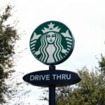 A Starbucks Coffee sign.