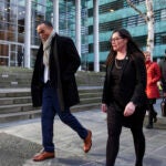 Washington Attorney General Nick Brown departs a press availability.