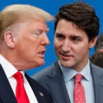 U.S. President Donald Trump and Canadian Prime Minister Justin Trudeau talk.