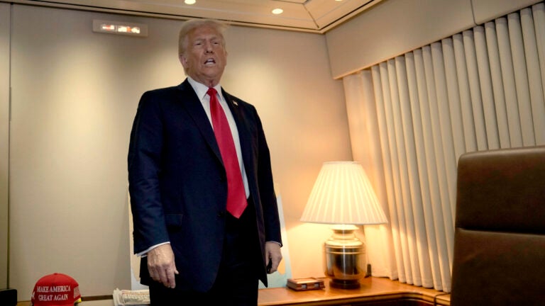 President Donald Trump speaks to reporters.