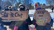 Hundreds march in Boston to support democracy and protest policies of Trump, Musk