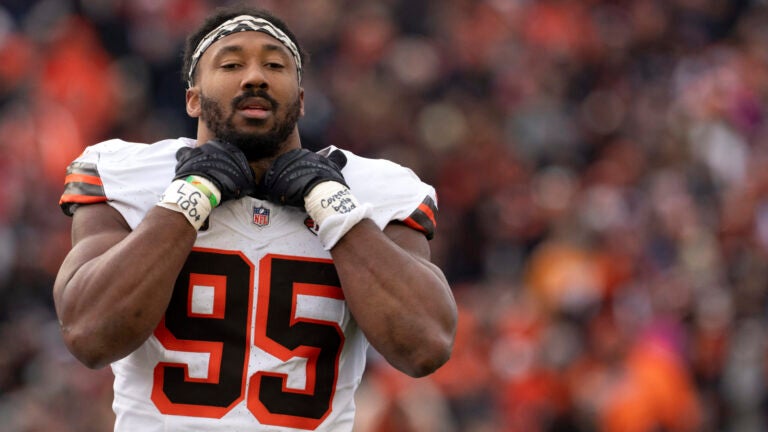 Cleveland Browns defensive end Myles Garrett rests between plays during the first half of an NFL football game against the Cincinnati Bengals, Sunday, Dec. 22, 2024, in Cincinnati.