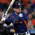 Houston Astros' Alex Bregman bats during the fifth inning of a baseball game against the Los Angeles Angels, Sept. 22, 2024, in Houston.