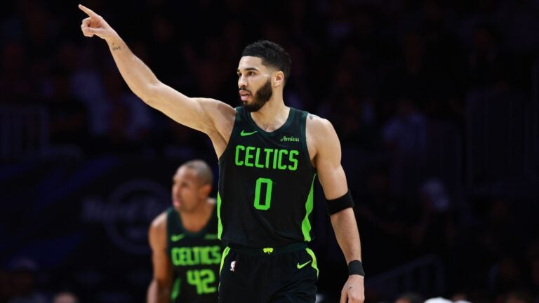 Jayson Tatum of the Celtics reacts to a basket against the Miami Heat during the second half at Kaseya Center on February 10, 2025 in Miami, Florida.