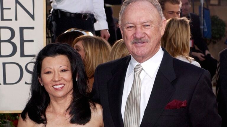 FILE - Actor Gene Hackman arrives with his wife, Betsy Arakawa, for the 60th Annual Golden Globe Awards in Beverly Hills, Calif., Sunday, Jan. 19, 2003.