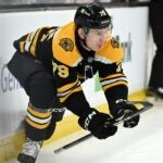 BOSTON, MASSACHUSETTS - FEBRUARY 01: Michael Callahan #79 of the Boston Bruins skates off of the ice after an injury during the second period against the New York Rangers at the TD Garden on February 01, 2025 in Boston, Massachusetts.