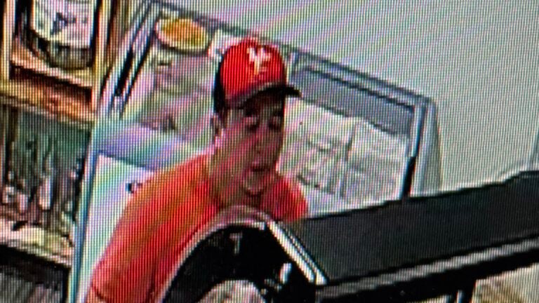 A security camera captured a video of one of the alleged scammers.