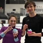 Skaters enjoying The World's Swirl at ice rink.