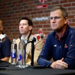 Sam Kennedy, president and CEO of the Boston Red Sox, Craig Breslow, chief baseball officer, and Alex Cora, team manager, sit during the end-of-season press conference at Fenway Park.