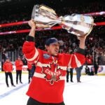 BOSTON, MASSACHUSETTS - FEBRUARY 20: Brad Marchand #63 of Team Canada celebrates with his teammates after defeating Team United States in overtime to win the NHL 4 Nations Face-Off Championship Game at TD Garden on February 20, 2025 in Boston, Massachusetts.