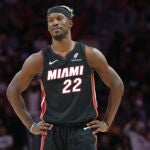 Miami Heat forward Jimmy Butler stands on the court during the second half of an NBA basketball game against the San Antonio Spurs, Sunday, Jan. 19, 2025, in Miami.