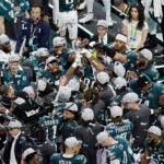 The Philadelphia Eagles hoist the Vince Lombardi Trophy after defeating the Kansas City Chiefs in the Super Bowl Sunday, Feb. 9, 2025, in New Orleans.