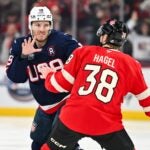 MONTREAL, CANADA - FEBRUARY 15: Matthew Tkachuk #19 of Team USA and Brandon Hagel #38 of Team Canada fight during the first period in the 2025 NHL 4 Nations Face-Off at the Bell Centre on February 15, 2025 in Montreal, Quebec, Canada. Team USA defeated Team Canada 3-1. (
