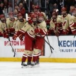BOSTON, MASSACHUSETTS - FEBRUARY 3: Teddy Stiga #4 of the Boston College Eagles celebrates his goal with Drew Fortescue #5 against the Northeastern Huskies during the first period during NCAA hockey in the semifinals of the annual Beanpot Hockey Tournament at TD Garden on February 3, 2025 in Boston, Massachusetts
