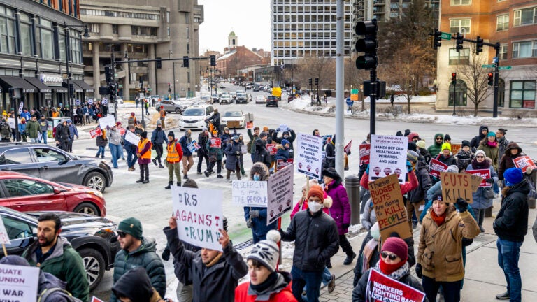 Photos: Protesters decry DOGE layoffs, budget cuts at Boston rally