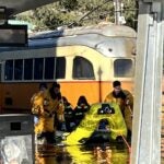 Milton fire officials rescued a Mattapan Line trolley's operator and passengers from flooding Tuesday morning.