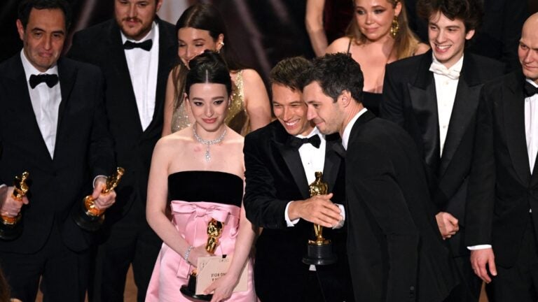 US producer Alex Coco, US filmmaker Sean Baker and US actress Mikey Madison accept the award for Best Picture for "Anora" onstage during the 97th Annual Academy Awards at the Dolby Theatre in Hollywood, California on March 2, 2025.