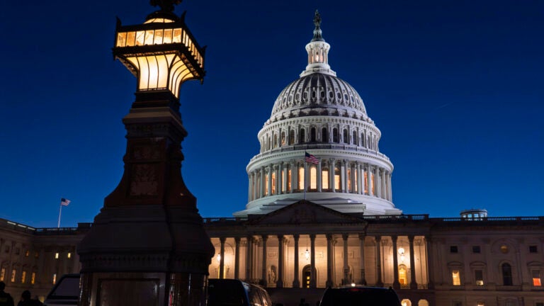 The US Capitol is illuminated at dusk before President Donald Trump's address to a joint session of Congress, in Washington, Tuesday, March 4, 2025.
