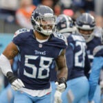 Tennessee Titans outside linebacker Harold Landry III celebrates an interception by a teammate during the first half of an NFL football game against the Cincinnati Bengals, Sunday, Dec. 15, 2024, in Nashville, Tenn.