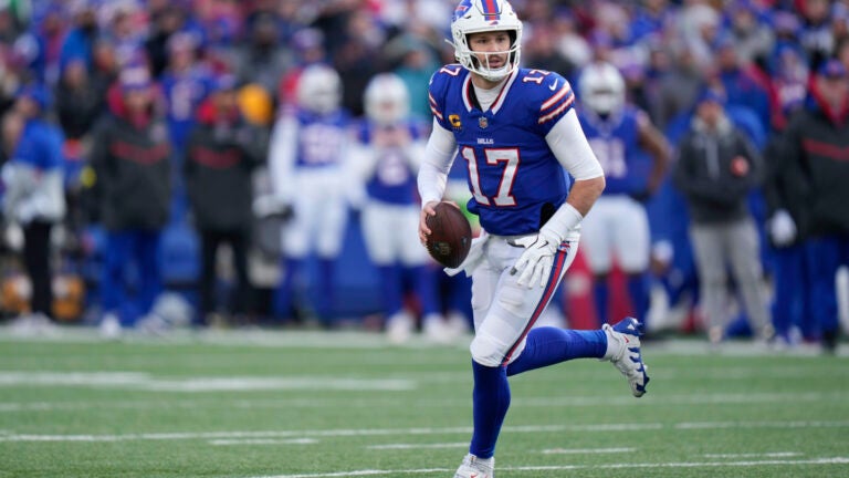 Buffalo Bills quarterback Josh Allen looks to throw during an NFL football game against the Denver Broncos, Sunday, Jan. 12, 2025, in East Rutherford, N.J.