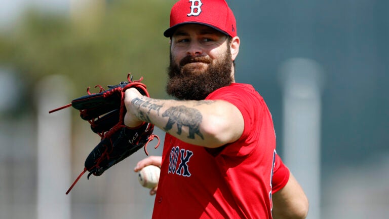 Boston Red Sox pitcher Lucas Giolito (54) throws during spring training at JetBlue Park.