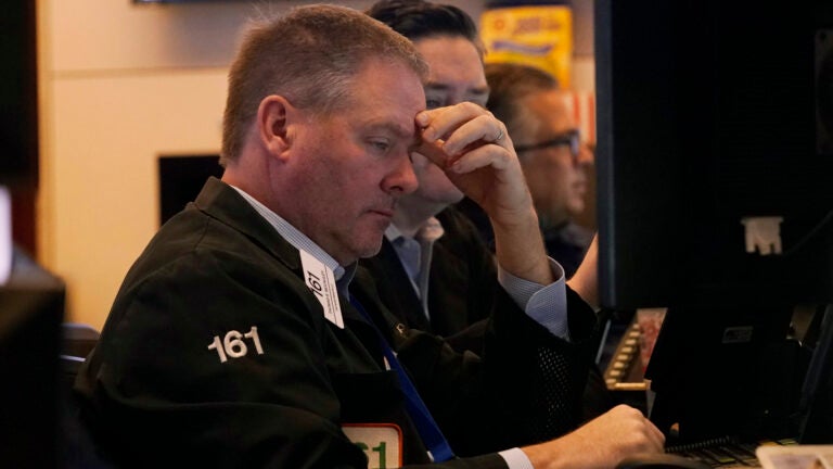 Traders work on the floor of the New York Stock Exchange, Tuesday, March 11, 2025.