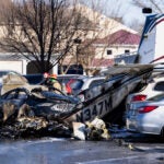 First responders work the scene after a plane crashed in the parking lot of a retirement community in Manheim Township, Pa., Sunday, March 9, 2025.