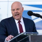 FILE - Postmaster General of the United States Louis DeJoy speaks during a news conference, Dec. 20, 2022, in Washington.