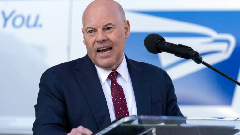 FILE - Postmaster General of the United States Louis DeJoy speaks during a news conference, Dec. 20, 2022, in Washington.