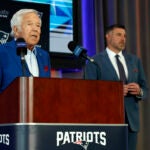 New England Patriots CEO Robert Kraft, left, introduces Mike Vrabel as the new head coach during a press conference at Gillette Stadium.