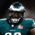 Philadelphia Eagles defensive tackle Milton Williams (93) celebrates after sacking Kansas City Chiefs quarterback Patrick Mahomes during the first half of the NFL Super Bowl 59 football game, Sunday, Feb. 9, 2025, in New Orleans.