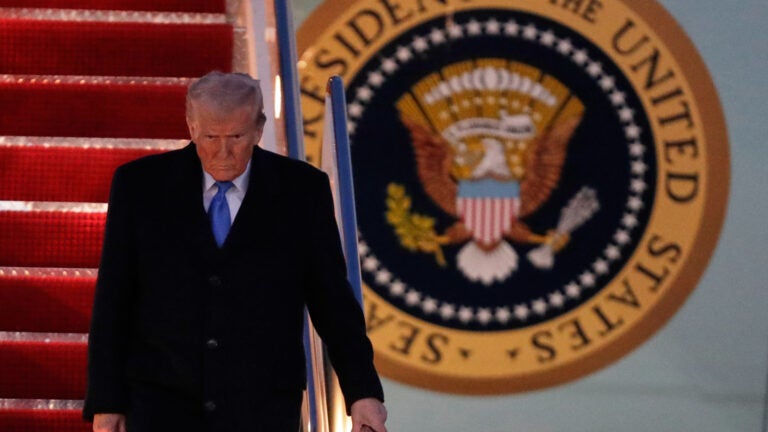 President Donald Trump walks down the stairs of Air Force One upon his arrival at Joint Base Andrews, Md., Sunday, March 9, 2025.