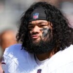 SANTA CLARA, CALIFORNIA - OCTOBER 06: Khyiris Tonga #95 of the Arizona Cardinals warms up prior to a game against the San Francisco 49ers at Levi's Stadium on October 06, 2024 in Santa Clara, California.