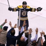 The Bruins Brad Marchand (63) beats Devils' goalie Cory Schneider (not pictured) late in the second period to give Boston a 3-2 lead, he called for some love from the fans and he got it. The Boston Bruins hosted the New Jersey Devils in a regular season NHL hockey game at the TD Garden.
