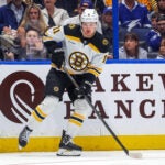 Casey Mittelstadt #11 of the Boston Bruins looks for a pass against the Tampa Bay Lightning during the first period at the Amalie Arena on March 8, 2025 in Tampa, Florida.