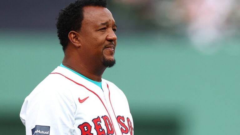 BOSTON, MASSACHUSETTS - SEPTEMBER 29: Former Boston Red Sox player Pedro Martinez looks on during a ceremony honoring the retirement of Hall of Fame Broadcaster Joe Castiglione before the game between the Tampa Bay Rays and Boston Red Sox at Fenway Park on September 29, 2024 in Boston, Massachusetts.