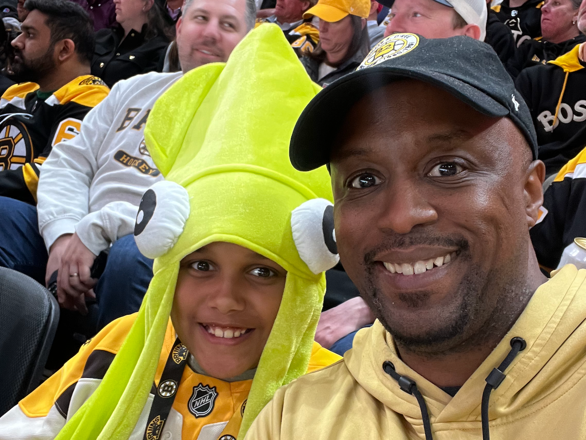Miles and Ian Willards take in a Bruins game at TD Garden.