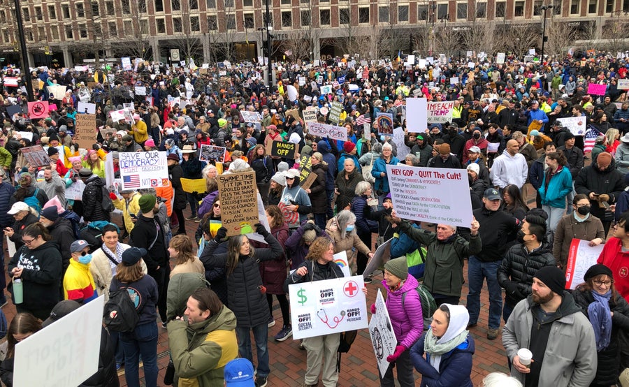 18 photos from Boston's 'Hands Off!' protest against Trump, Musk