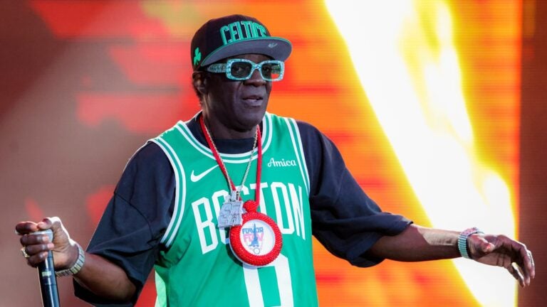 Boston Calling 2025 review: Flava Flav of Public Enemy performs on the Blue Stage on Sunday, May 25, 2025.