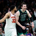 Boston Celtics center Luke Kornet (40) reacts after a slam dunk during the fourth quarter in game five of the NBA Eastern Conference semifinal against the New York Knicks at TD Garden.