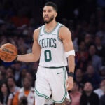 Boston Celtics' Jayson Tatum (0) looks to pass during the second half of Game 4 in the Eastern Conference semifinals of the NBA basketball playoffs against the New York Knicks Monday, May 12, 2025, in New York.