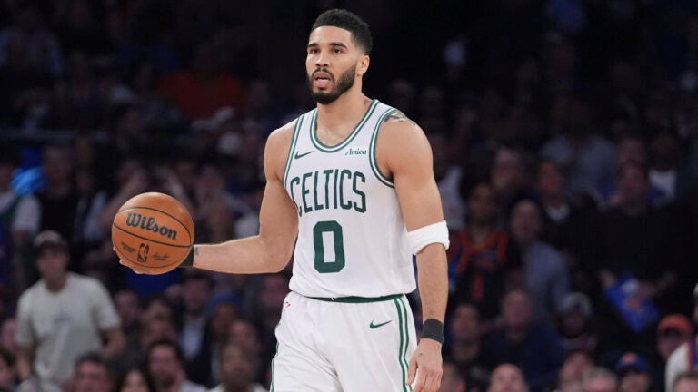 Boston Celtics' Jayson Tatum (0) looks to pass during the second half of Game 4 in the Eastern Conference semifinals of the NBA basketball playoffs against the New York Knicks Monday, May 12, 2025, in New York.