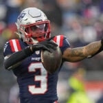 New England Patriots wide receiver DeMario Douglas (3) reacts after gaining a first down during the second half of an NFL football game against the Los Angeles Chargers, Saturday, Dec. 28, 2024, in Foxborough, Mass.