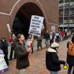 FILE - Protesters gather outside federal court during a hearing for Rumeysa Ozturk, a Tufts University doctoral student from Turkey who was detained by immigration authorities, April 3, 2025, in Boston.