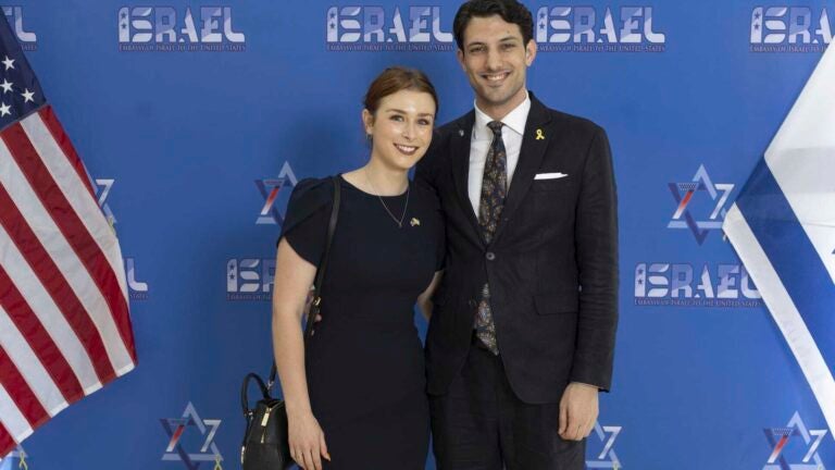 This undated handout photo provided by the embassy of Israel in the U.S. shows staff members of the Israeli Embassy in Washington, Israeli citizen Yaron Lischinsky, right, and U.S. citizen Sarah Milgrim.
