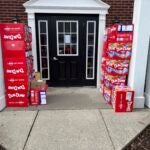 This image provided by Holly LaFavers shows boxes of Dum-Dum lollipops outside of her home Monday, May 5, 2025, in Lexington, Ky.