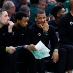 Boston Celtics head coach Joe Mazzulla (second from right) on the bench during the second quarter in game one of the NBA Eastern Conference semifinal against the New York Knicks at TD Garden.